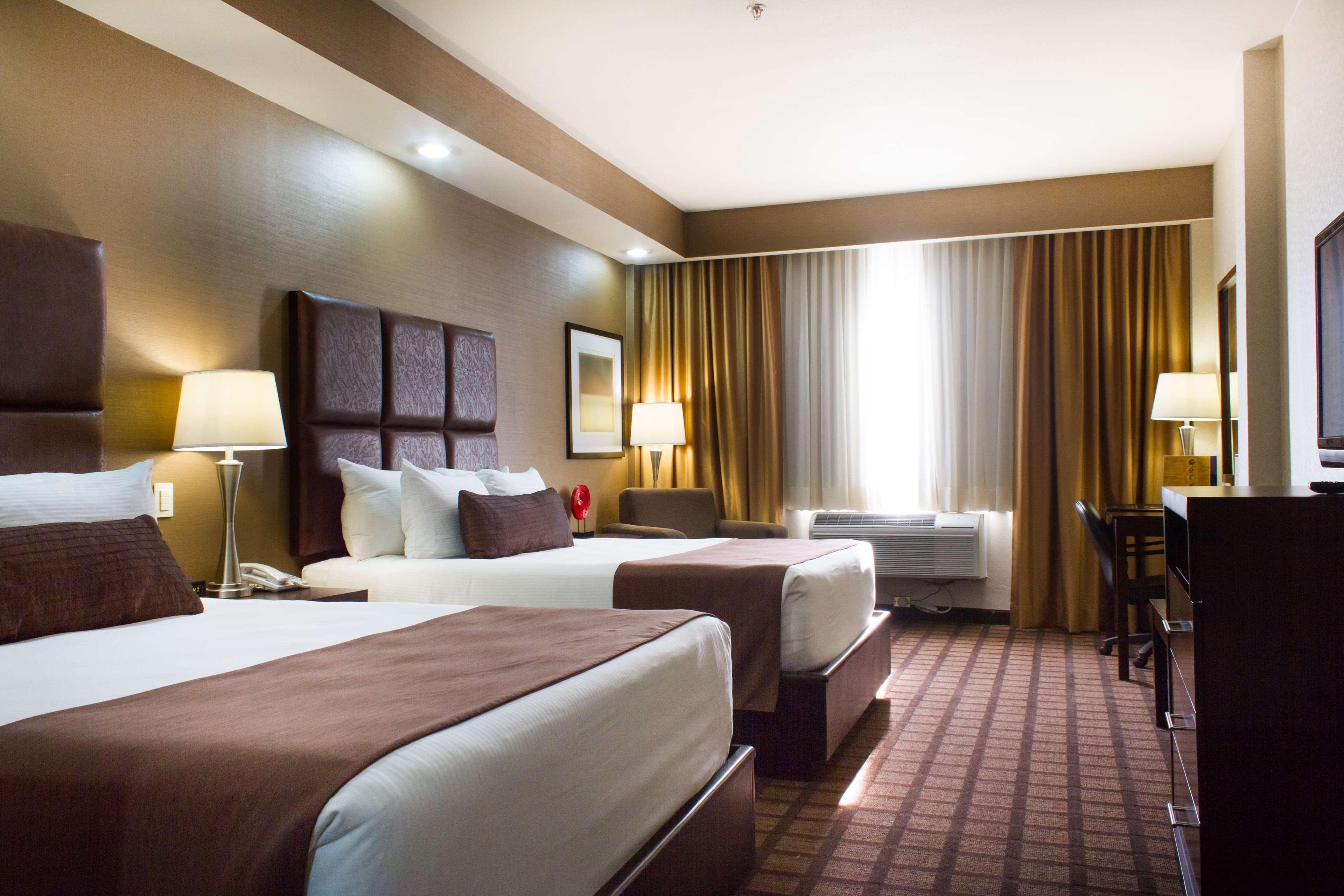 Best Western Premier Monterrey Aeropuerto Apodaca Ngoại thất bức ảnh A typical hotel room