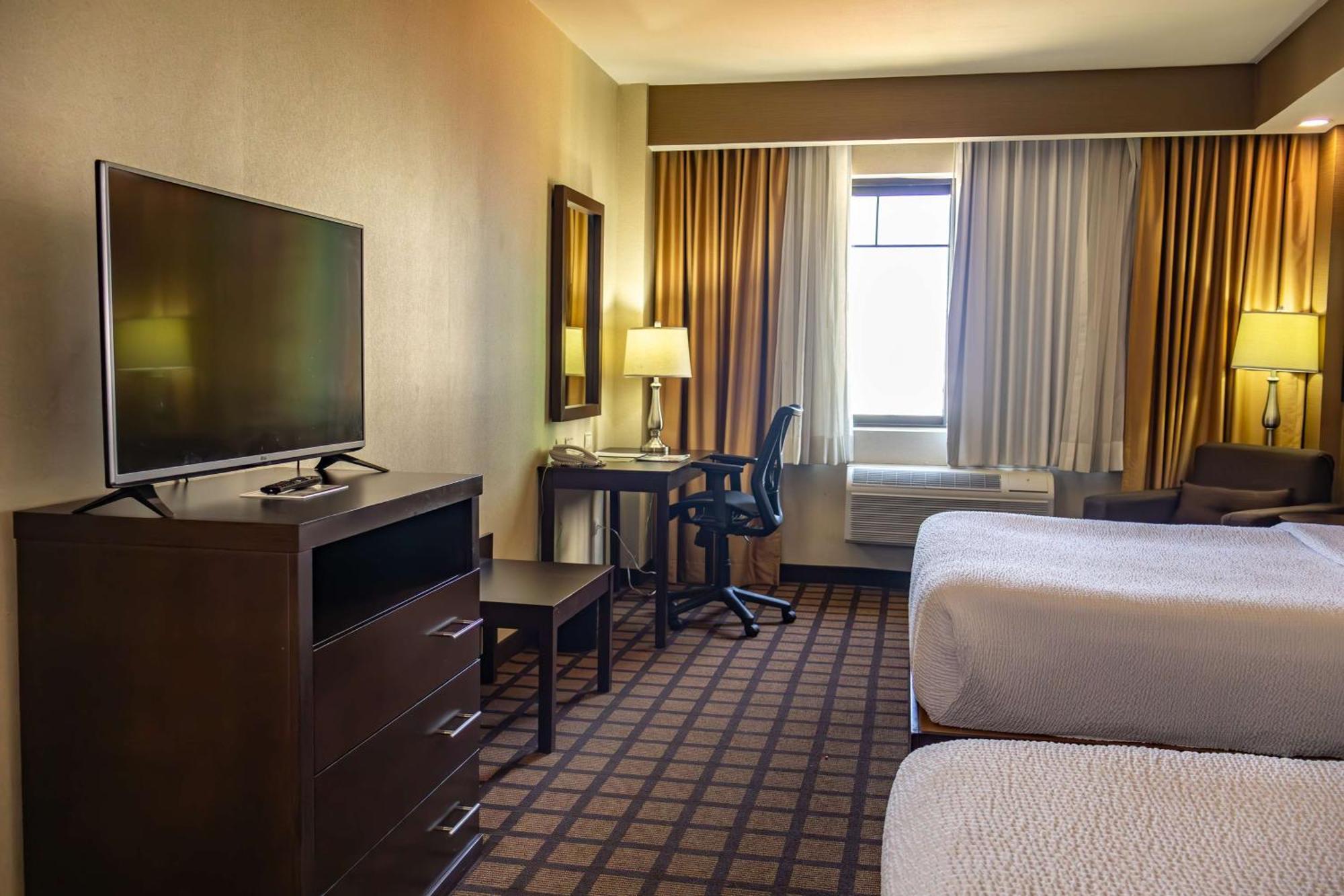 Best Western Premier Monterrey Aeropuerto Apodaca Ngoại thất bức ảnh A typical room at the Hilton Garden Inn