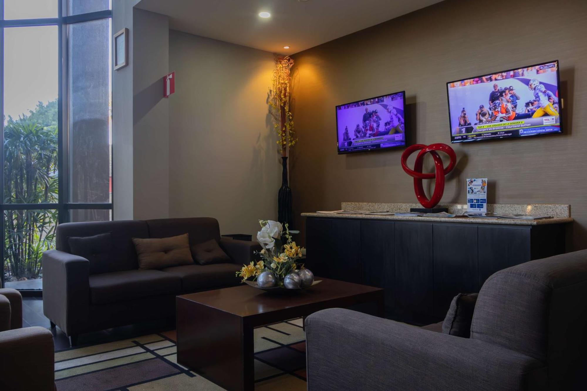 Best Western Premier Monterrey Aeropuerto Apodaca Ngoại thất bức ảnh The lobby of the hotel
